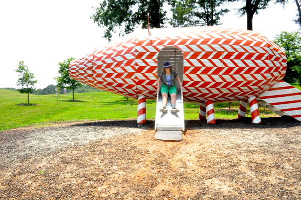 Karen Duquette on the pig-shaped slide